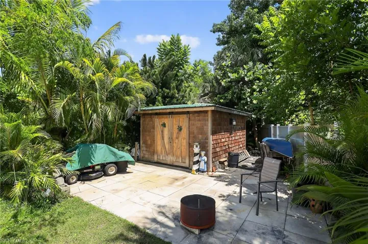 View of patio / terrace featuring an outbuilding