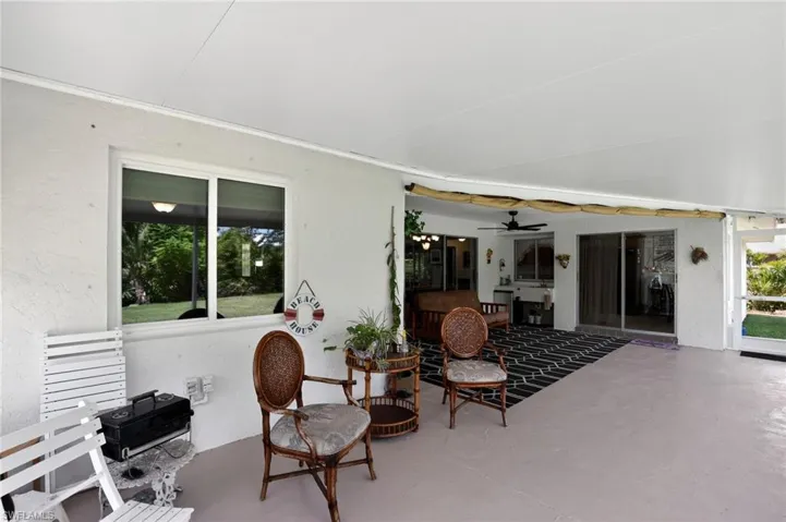 View of patio with ceiling fan