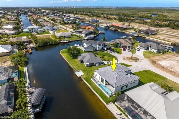 Aerial view of residential area with a large body of water