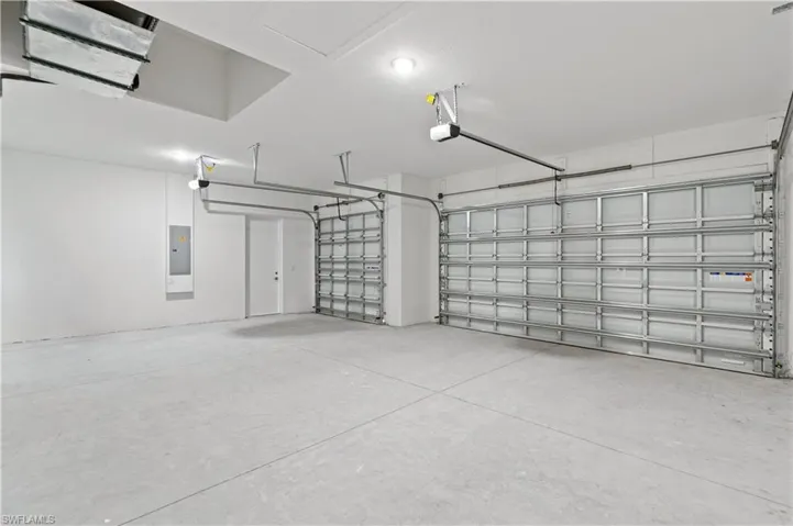 Garage featuring electric panel