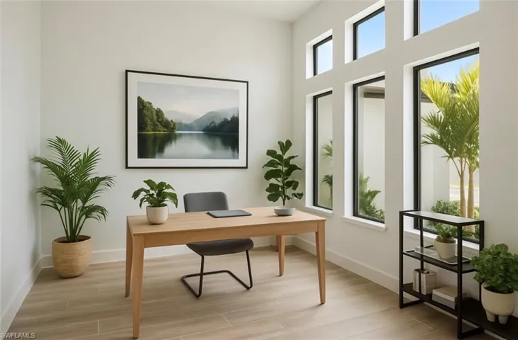 Office with light wood finished floors