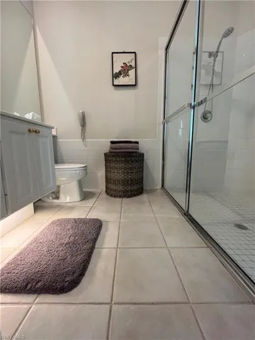 His Primary Bathroom with shower andseparate vanity