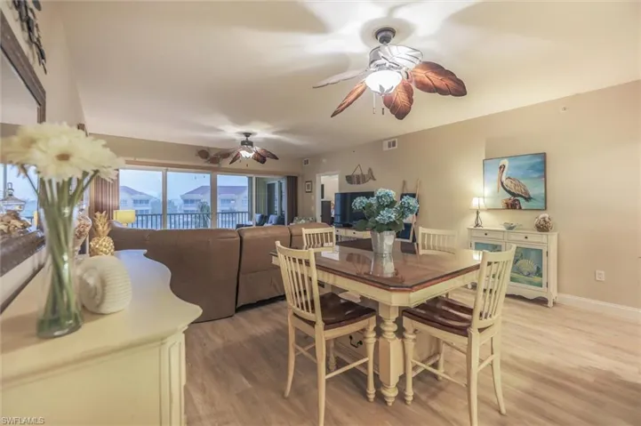 Dining area with hardwood / wood-style flooring