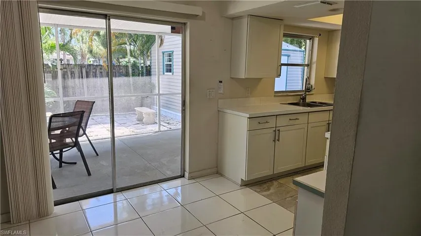 Sliding glass doors to private lanai