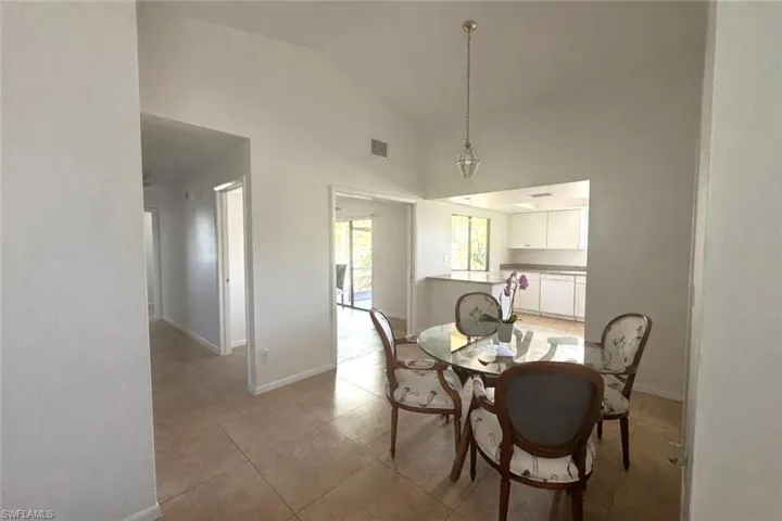 Entryway through the garage door. Connected to foyer, kitchen, living room, and hallway.
