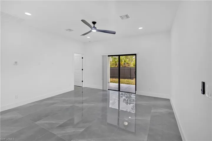 Spare room featuring recessed lighting and ceiling fan