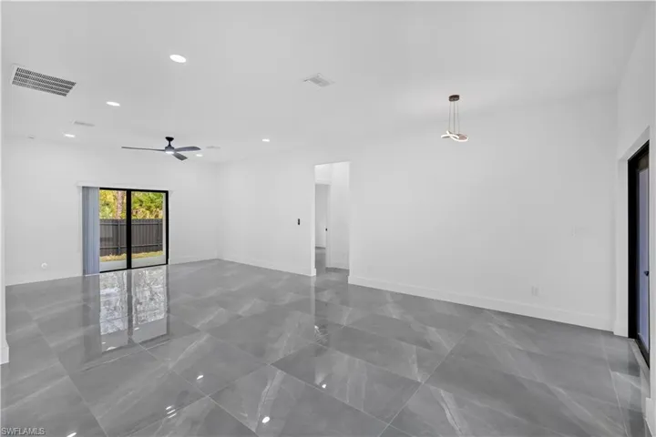 Unfurnished room featuring recessed lighting and ceiling fan