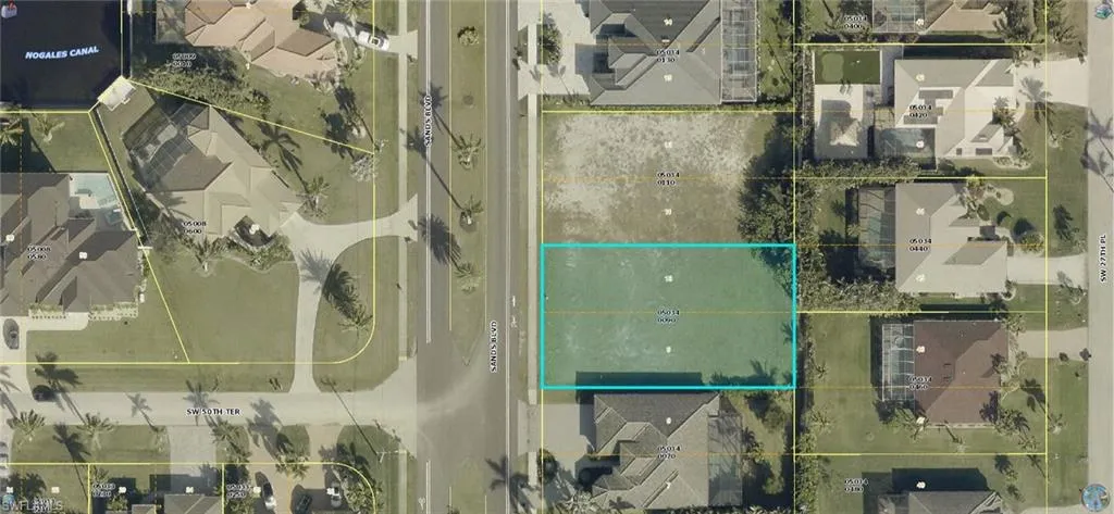 Aerial overview of property's location featuring property parcel outlined