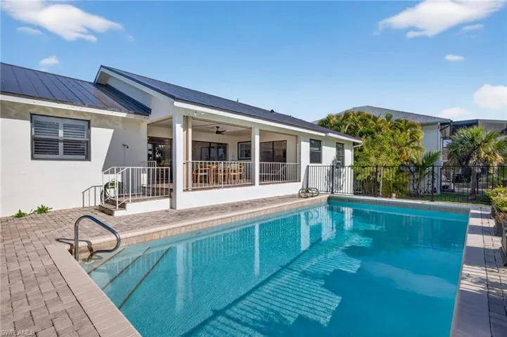 View of pool featuring patio surround