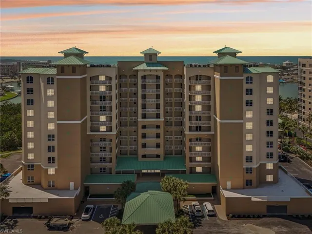 Property at dusk with a water view