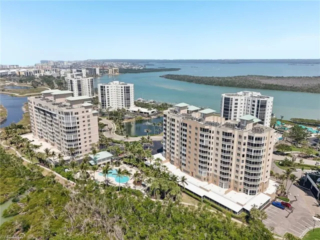 Drone / aerial view featuring a water view and a city view