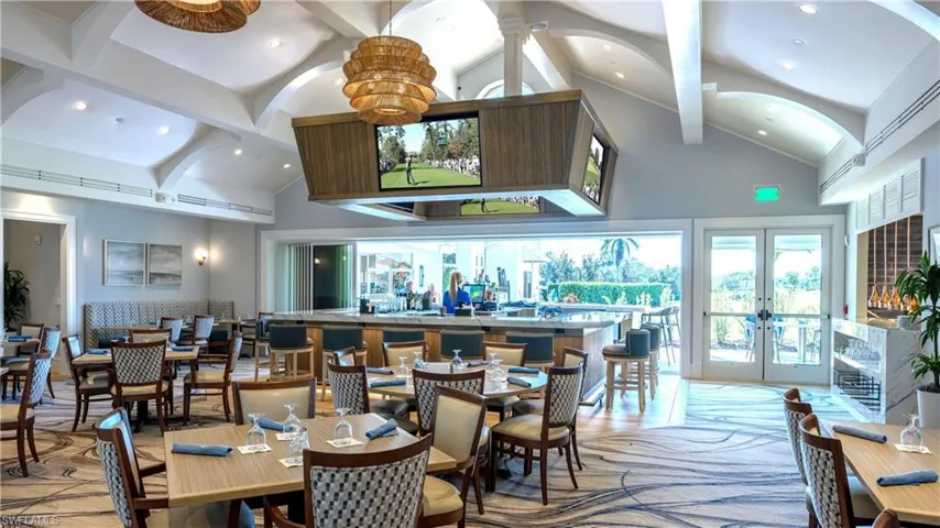 Dining room with french doors, beam ceiling, high vaulted ceiling, and recessed lighting
