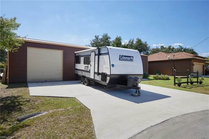 Detached 1800 SqFt Garage, with two 10' toll up doors, dedicated offices and workshop space.