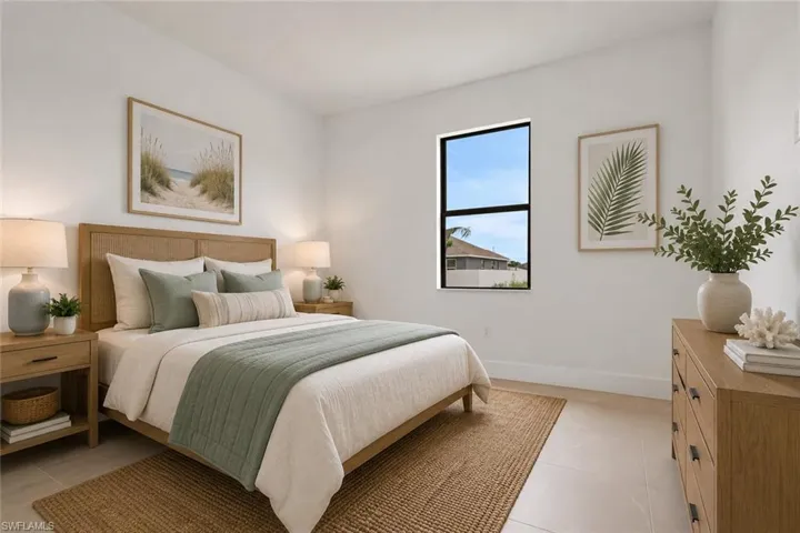Interior room featuring light-colored tile flooring, white walls, and a single window with black framing