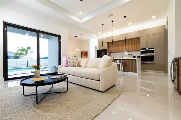Living room with washer / clothes dryer