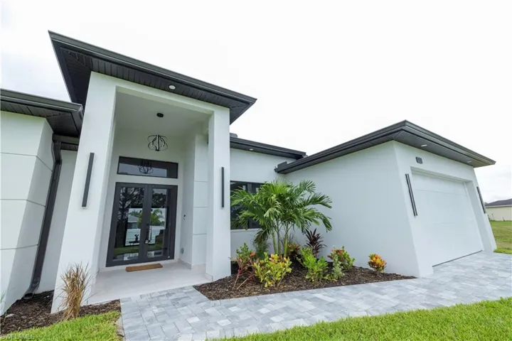 Entrance to property with a garage