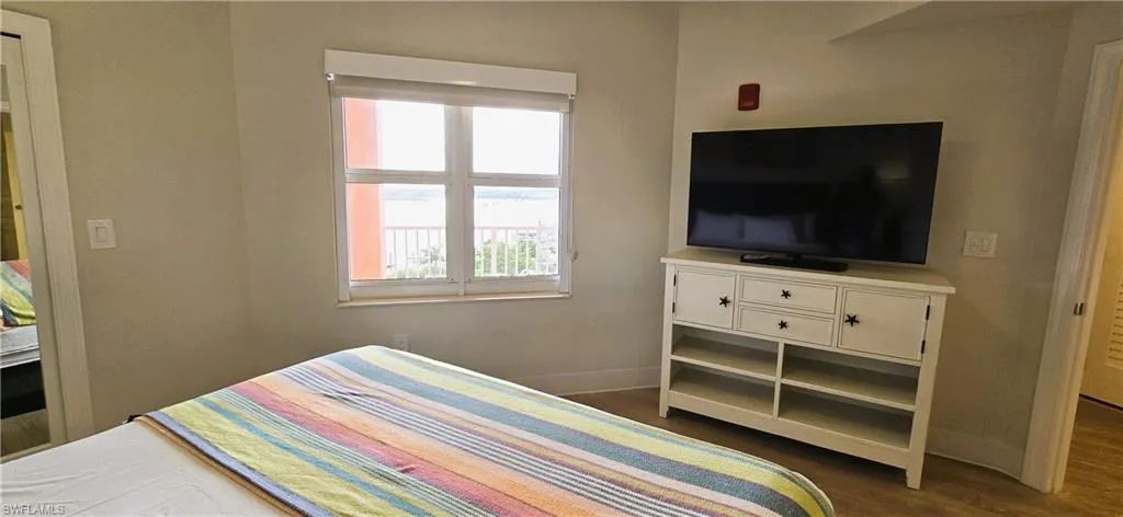 Bedroom featuring  hardwood / wood-style flooring