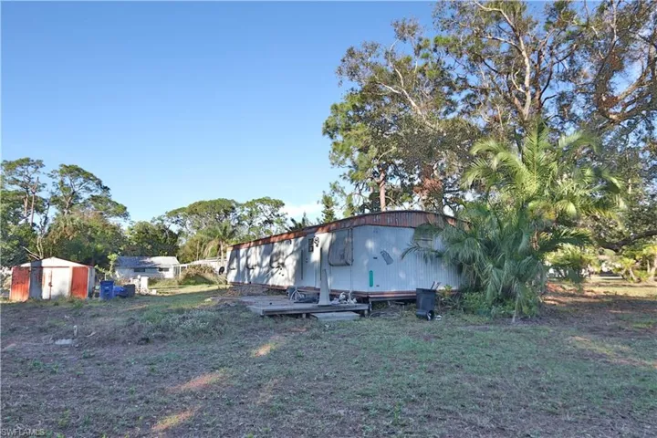 View of yard featuring a storage shed