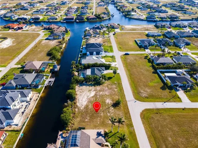 Bird's eye view with a residential view and a water view