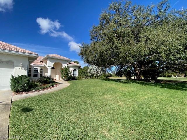 712 Mirror Lakes DR, LEHIGH ACRES FL 33974