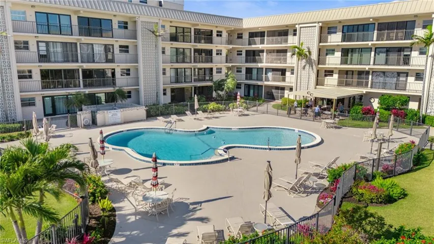 Community pool featuring a patio area