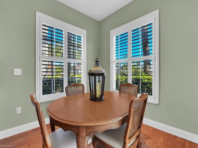 Dining room with wood-type flooring
