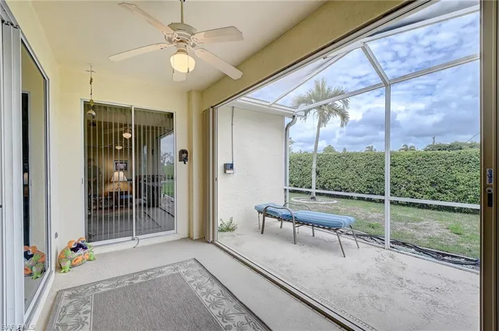 Sunroom / solarium featuring ceiling fan and plenty of natural light
