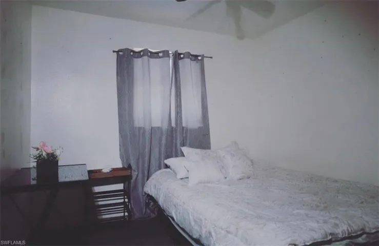 Bedroom featuring a ceiling fan