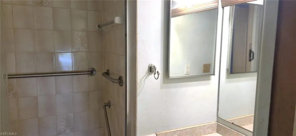 Bathroom with tiled shower