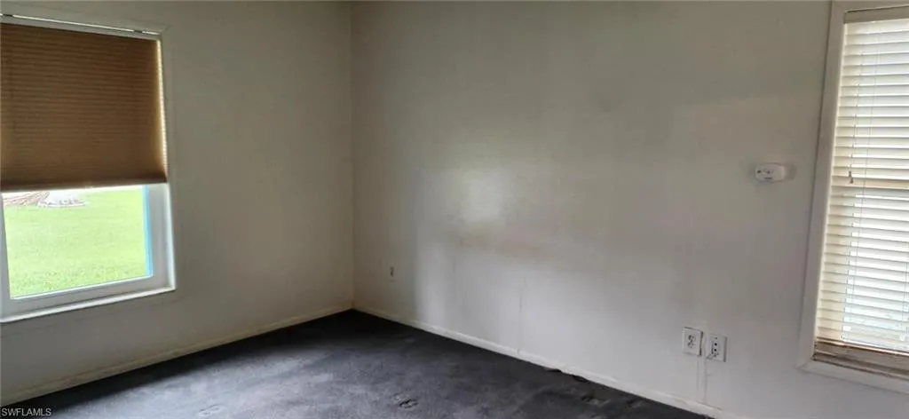Spare room with carpet flooring