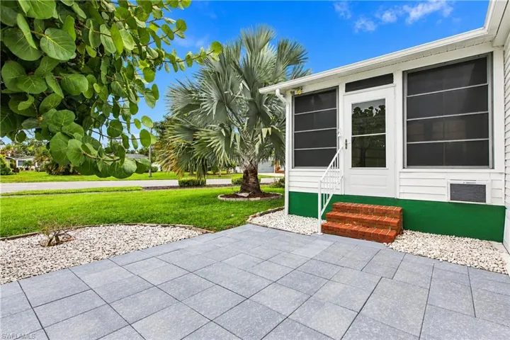 Paved patio with a surrounding white gravel border