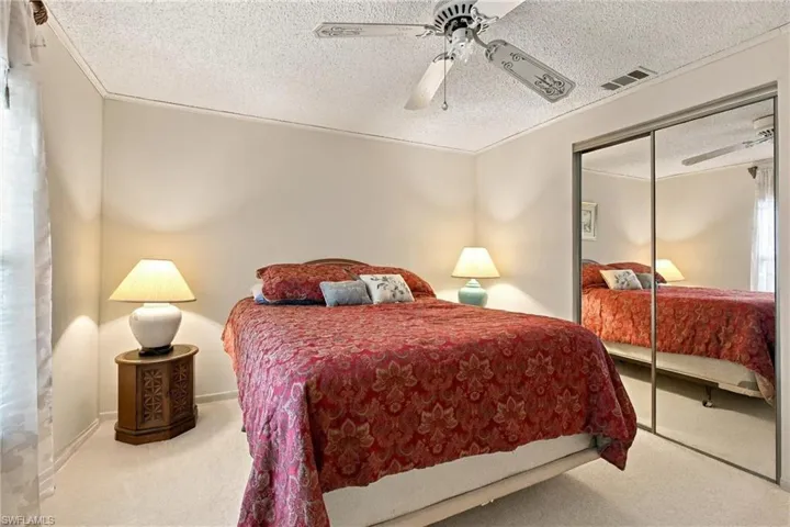 Wall-to-wall carpeting and neutral wall tones