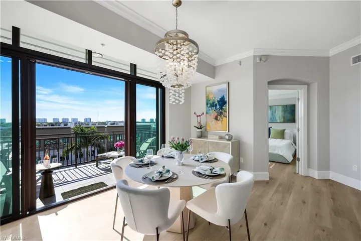 Dining space featuring a city view and a Spectacular Chandelier