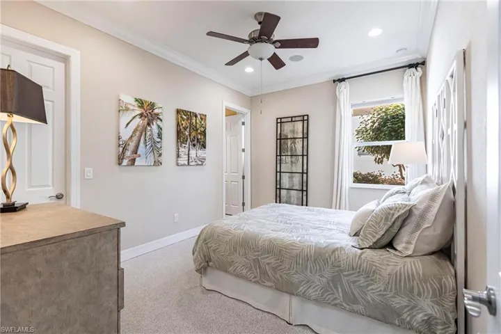 Bedroom featuring crown molding, light colored carpet, a ceiling fan, and recessed lighting