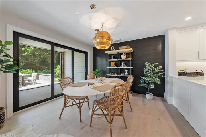 Dining space with light wood-type flooring