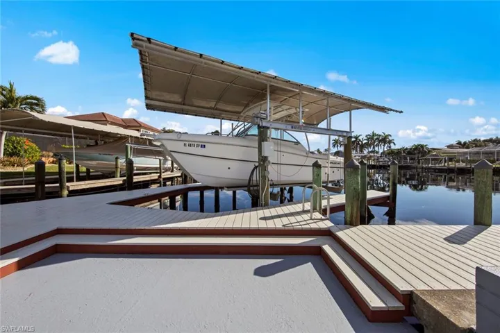 View of dock with a water view boat for sale
