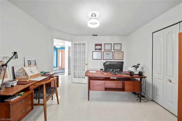 Office area featuring french doors