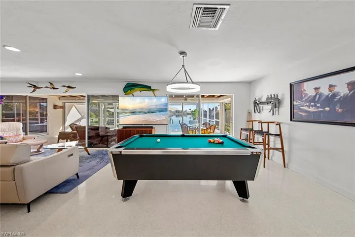 Playroom with pool table