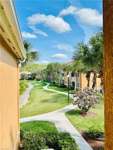 View of community with a yard