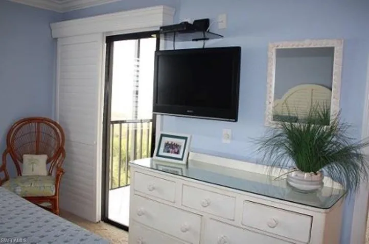 Primary Bedroom featuring multiple windows pre Ian