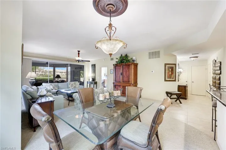 Dining room featuring light tile patterned floors