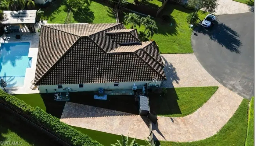 View from above of property featuring a pool