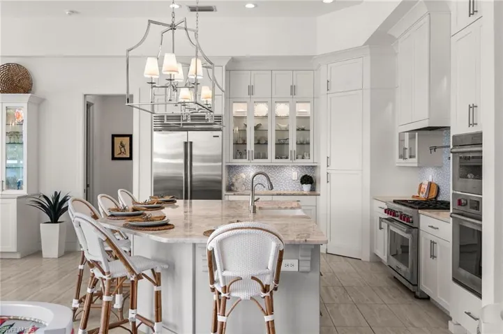 Wolf Appliances throughout, including the 6 burner gas stove