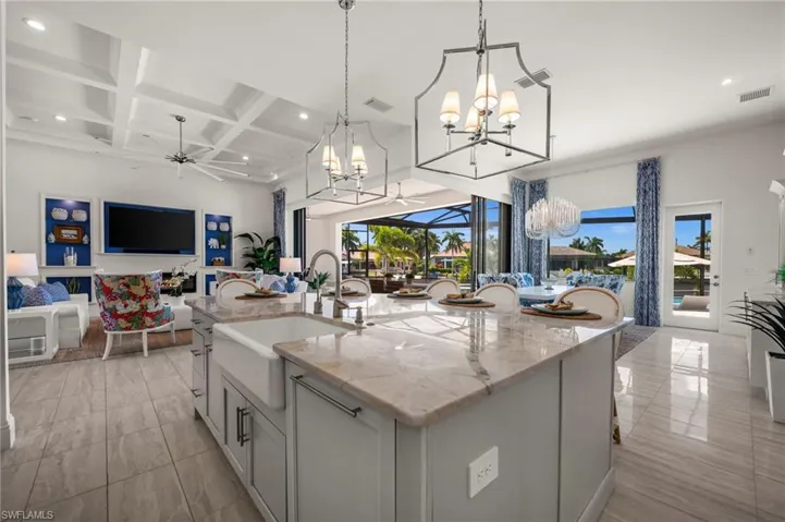 Views from the custom kitchen to the custom pool!