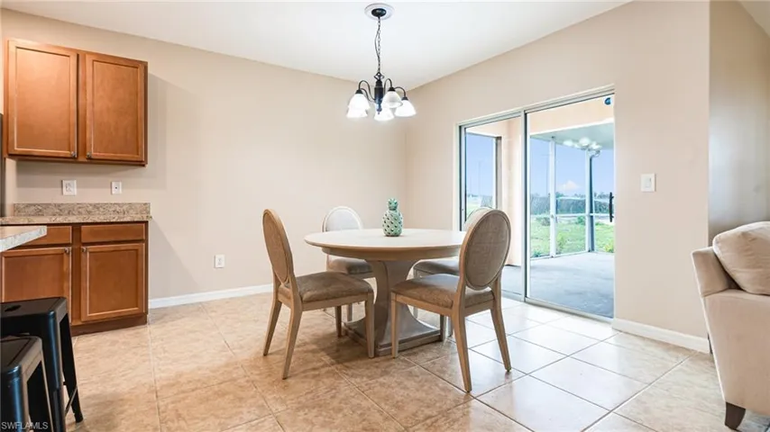 Dining Area open to outside screened in lanai