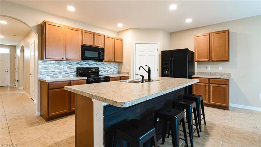 Kitchen with a walk in pantry.