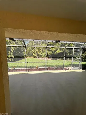 View of patio / terrace with a lanai and a sunroom