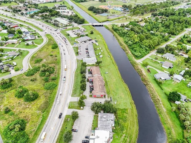 View of property location featuring a major roadway and a nearby body of water