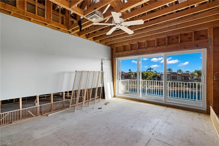 Primary Bedroom featuring ceiling fan