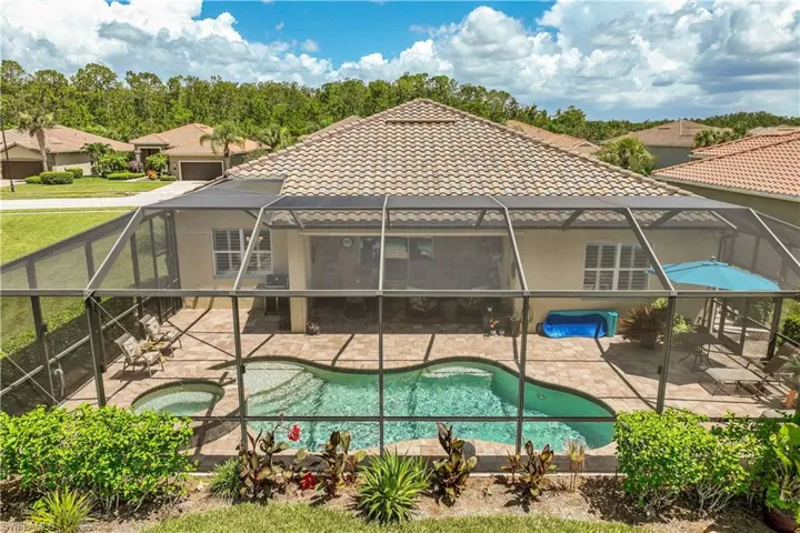 View of pool featuring a patio and a lanai